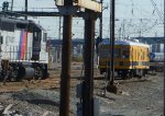 Sperry Rail Service railcar 125 at Hudson Interlocking with NJT GP40-2 4303